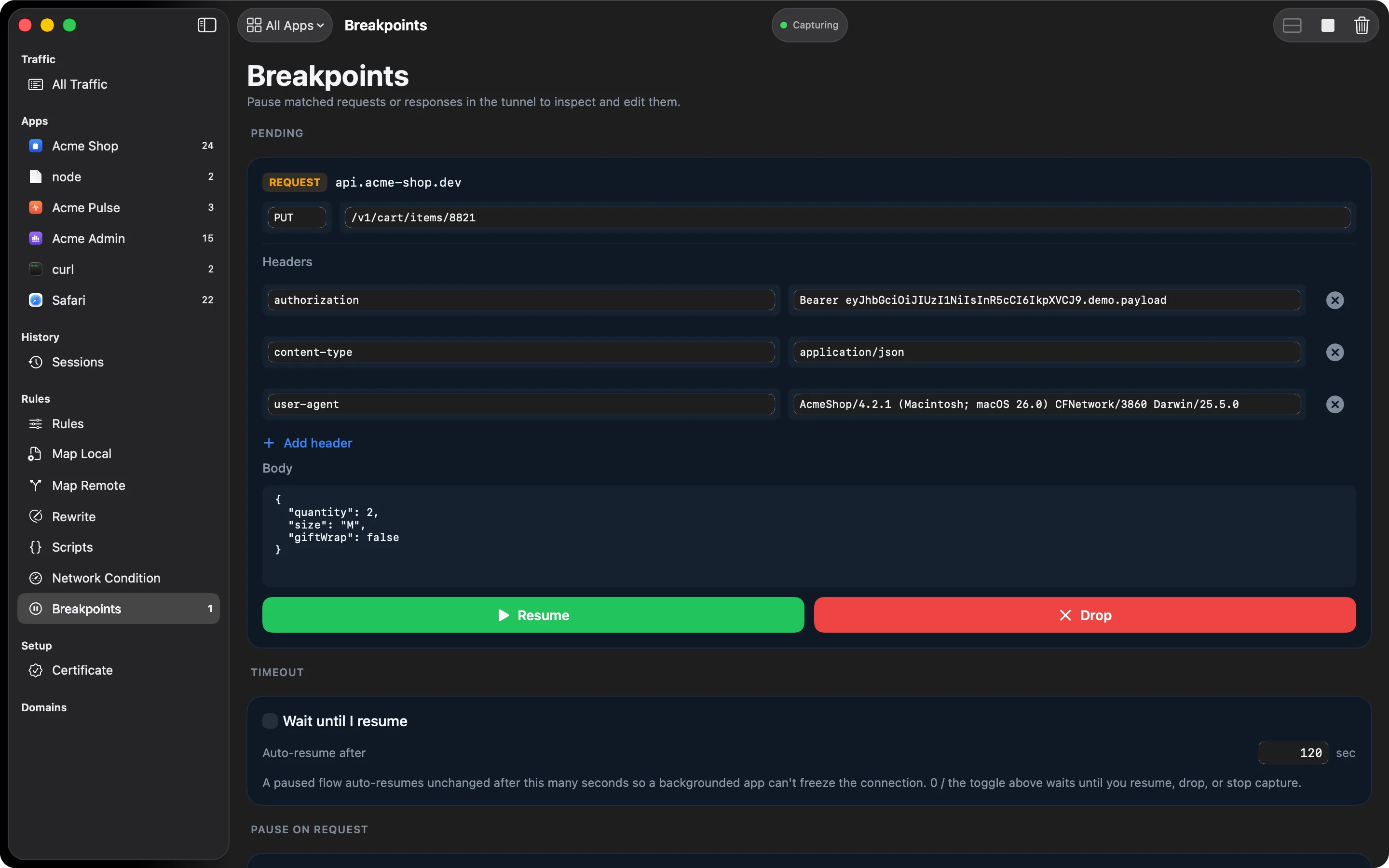 A request paused at a breakpoint, with editable headers and body and Resume and Drop buttons